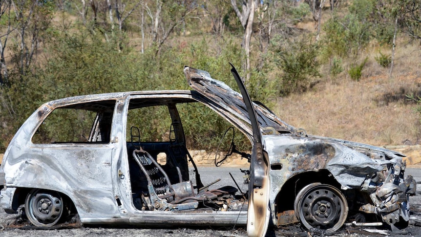 Burnt-out car near Kambah Pools