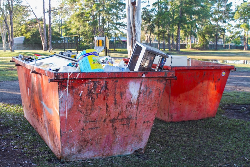 Flood damaged equipment in skips