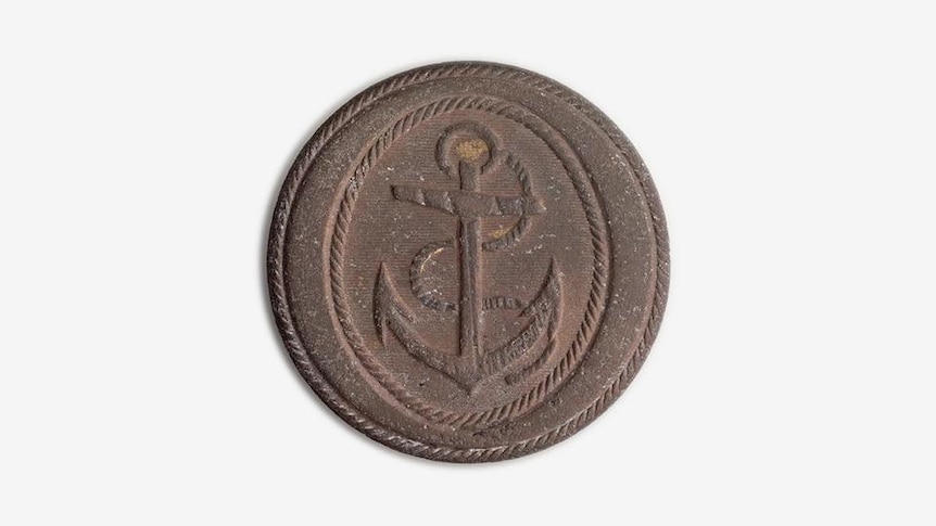 Button with anchor on it