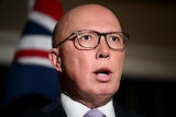Close up of Peter Dutton in glasses.