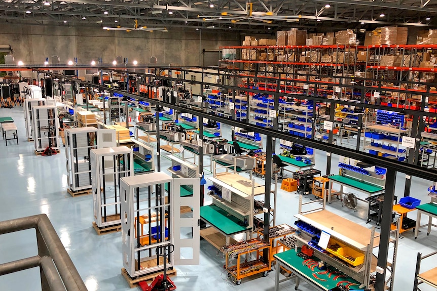 A view of a busy factory floor making EV chargers