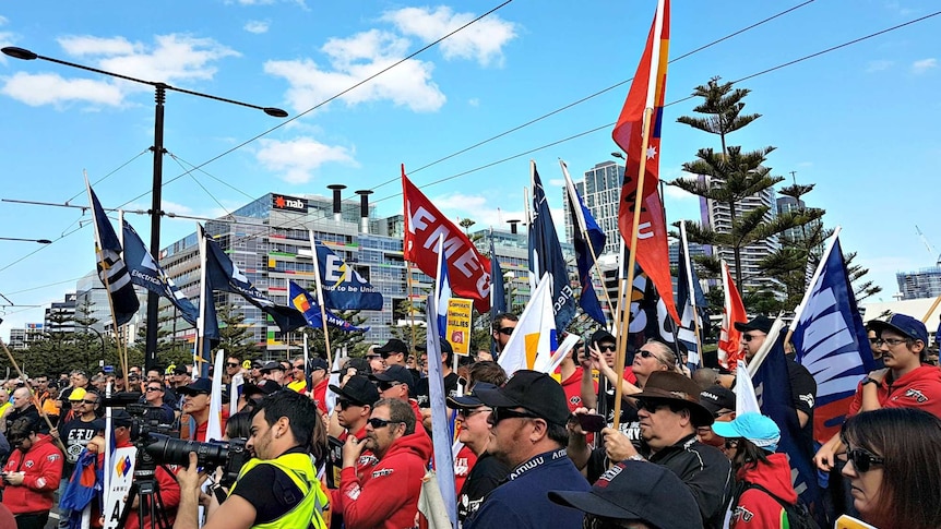 Unions march against CUB enterprise agreement