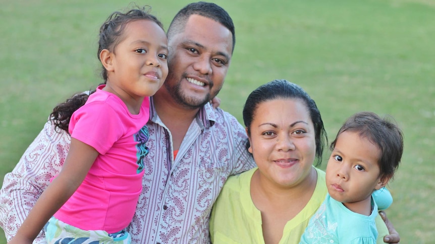 A family portrait of the Hausia family, Tevita, Sesilia and two young girls.