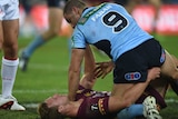 Robbie Farah holds down Daly Cherry-Evans