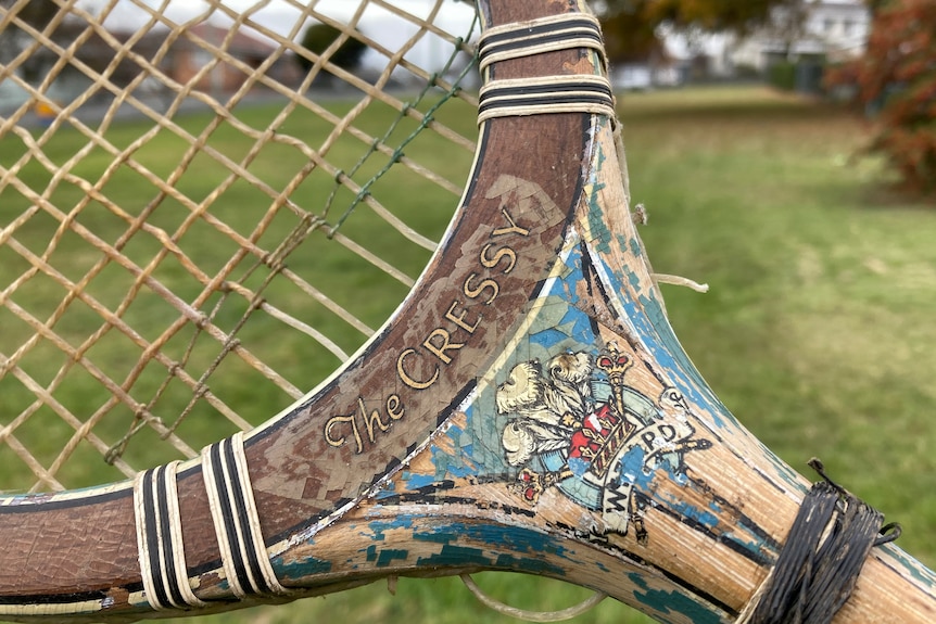 an old photo of a tennis racquet with the words 'the Cressy' 