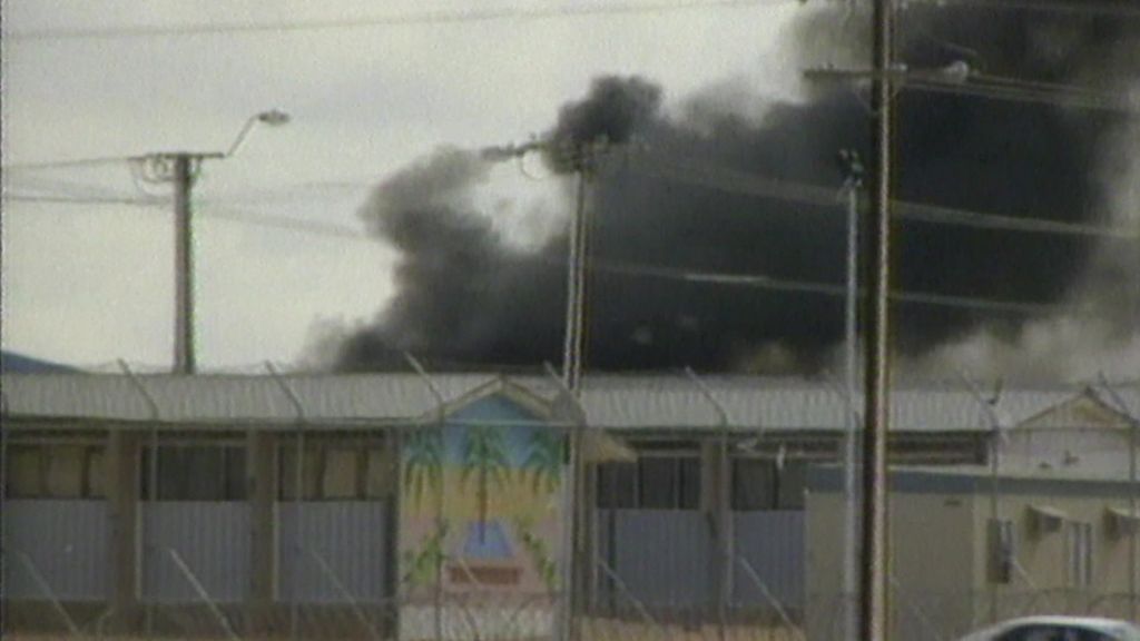 Lateline story from 2000 on the riots at the Woomera immigration ...