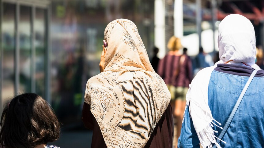 Muslim women and young girl on a street in Sydney