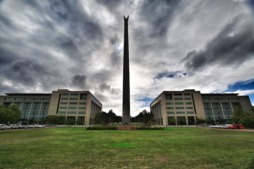 The Australian American memorial with two Defence buildings on either side.