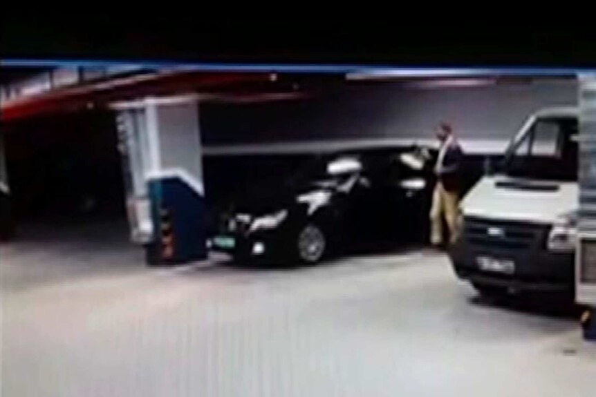 CCTV still image showing a man getting out of a vehicle seemingly with Saudi consulate plates, in an Istanbul parking garage.
