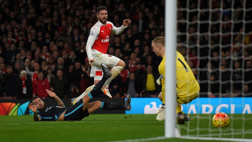 Olivier Giroud scores Arsenal's second goal against Manchester City on December 21, 2015.