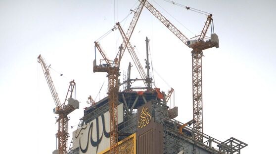 Cranes surround the world's largest clock, which looms over the Grand Mosque in Mecca
