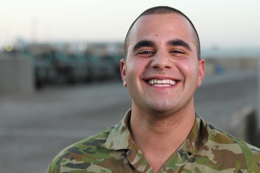 Private Richard Azar smiles.