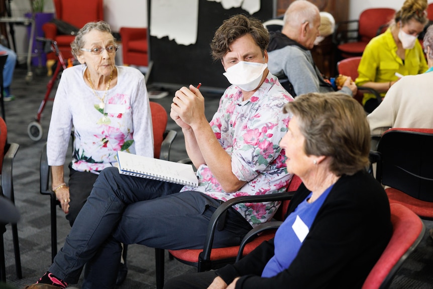 Terrapin Theatre artistic director Sam Routledge with residents at Uniting AgeWell's Lillian Martin aged care home.