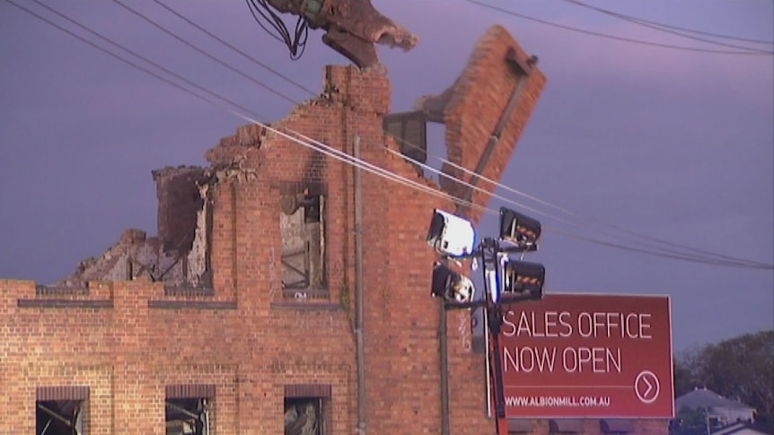 Parts of fire-ravaged historic Albion flour mill in Brisbane demolished on November 28, 2013.