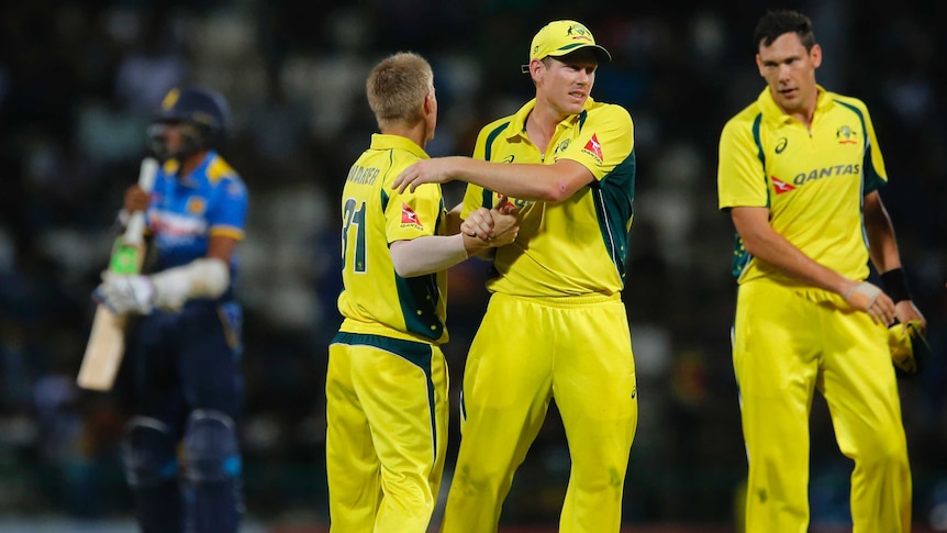Australian players celebrate their win over Sri Lanka in the T20 at Pallekele