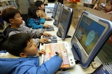 Kids play computer games