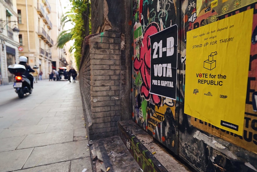 Campaign posters are seen in Catalonia.