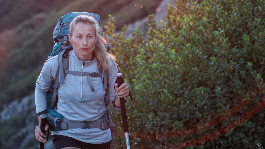 Woman hiking on mountain