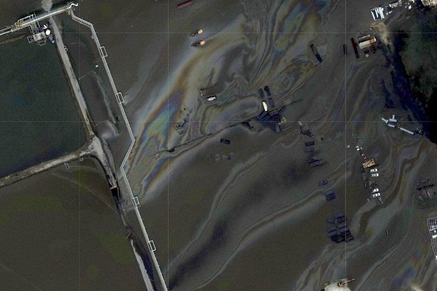 A visible oil slick is seen in this satellite image of a flooded refinery in Louisiana