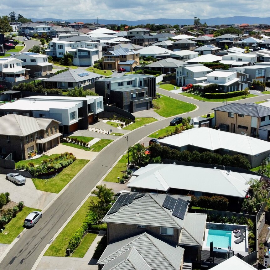 A drone shot of rows of houses in Shell Cove, Wollongong's south.