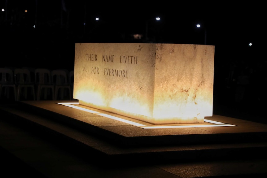 A slab with 'THEIR NAME LIVETH FOR EVERMORE' written on it.