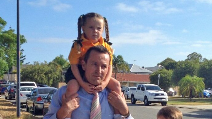 Mark McGowan with children on first day of school