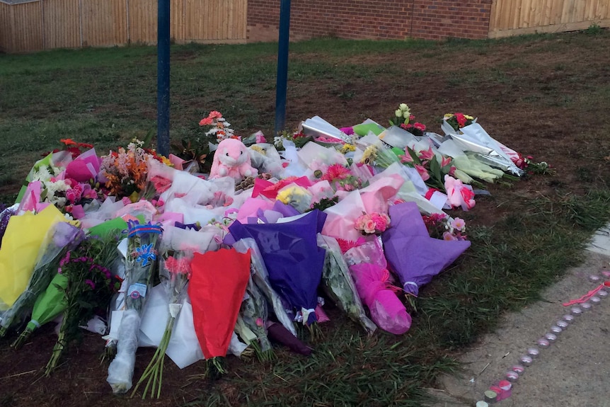 Flowers left for Masa Vukotic, who was killed in an apparent random attack at a park in Doncaster.