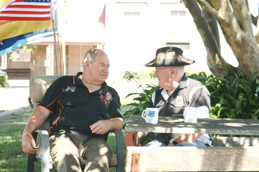 Vietnam War veterans Greg Carter and Ron Billing having a cup of tea together.