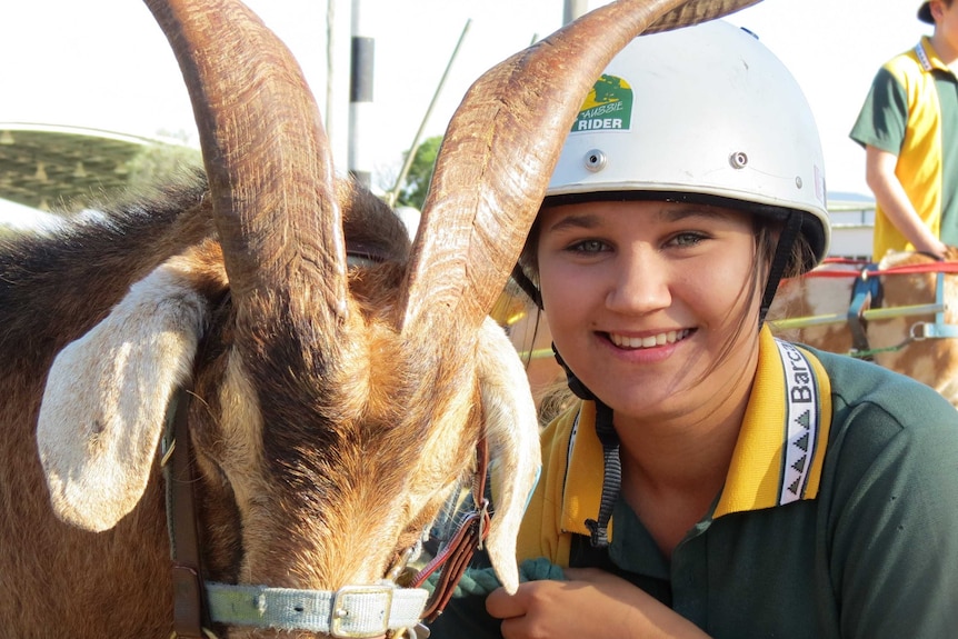 Cloe Gribble with goat Magnum at Barcaldine's annual goat race in April 2015.