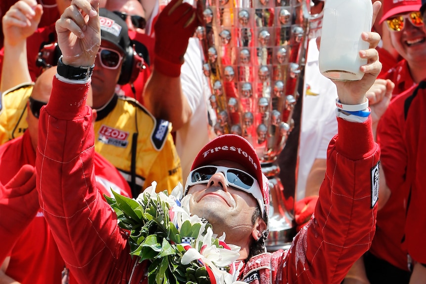 Dario Franchitti points to the heavens after an emotional Indy 500 victory.