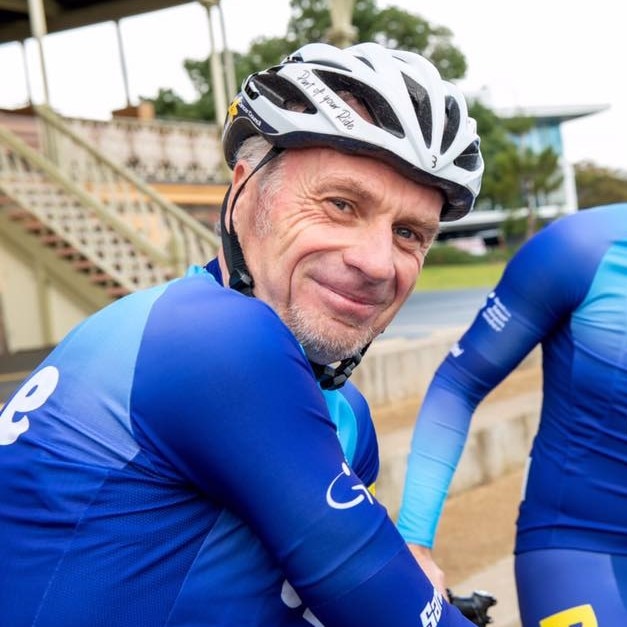 Patrick Jonker wearing a white helmet and blue lycra