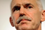 A worried George Papandreou after crisis talks.