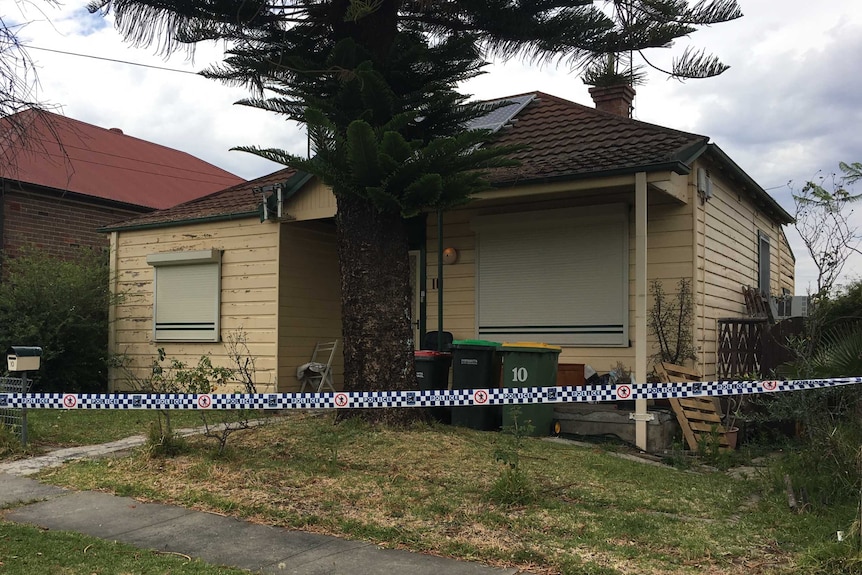 Photo of weatherboard home in Granville with police tape outside that police are searching for remains of missing girl