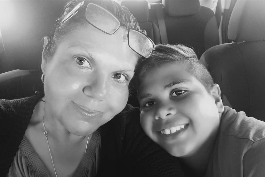 A black and white photo of Cassius with his mum Mechelle Turvey