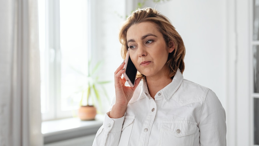 A woman talking on her mobile phone.