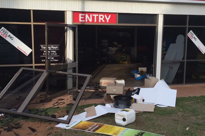 Doors smashed out of a Kununurra car dealership by a stolen car.