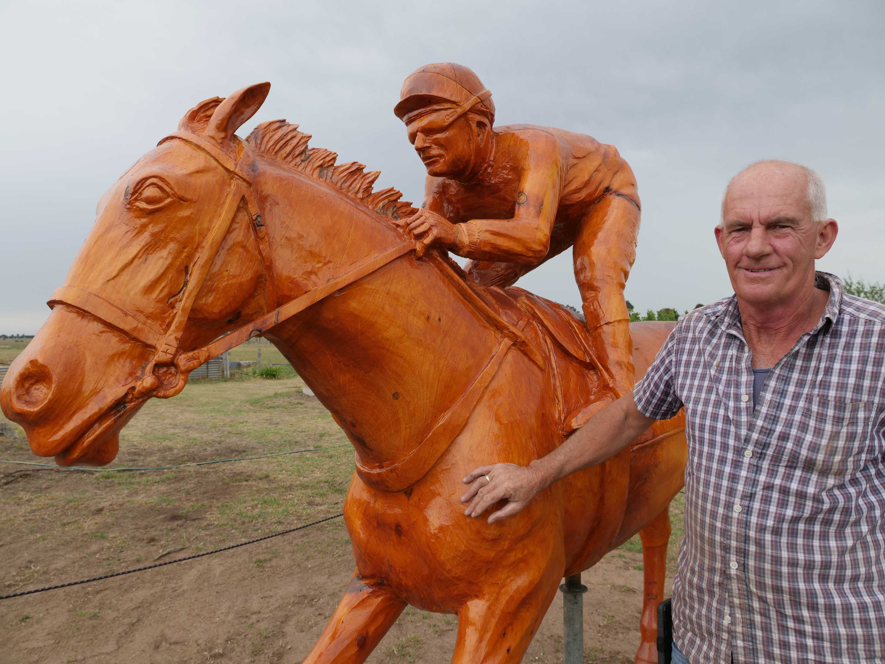 Winx inspires chainsaw artist John Brady to carve her for