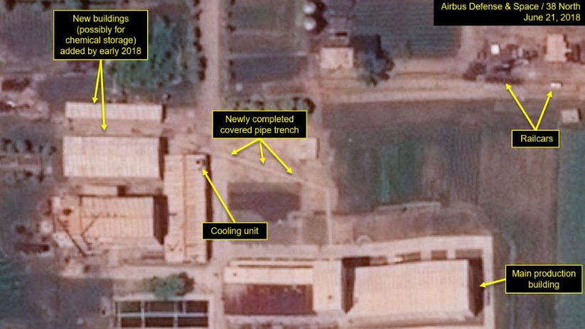 Satellite images showing the pipeline connecting new buildings and the main production building