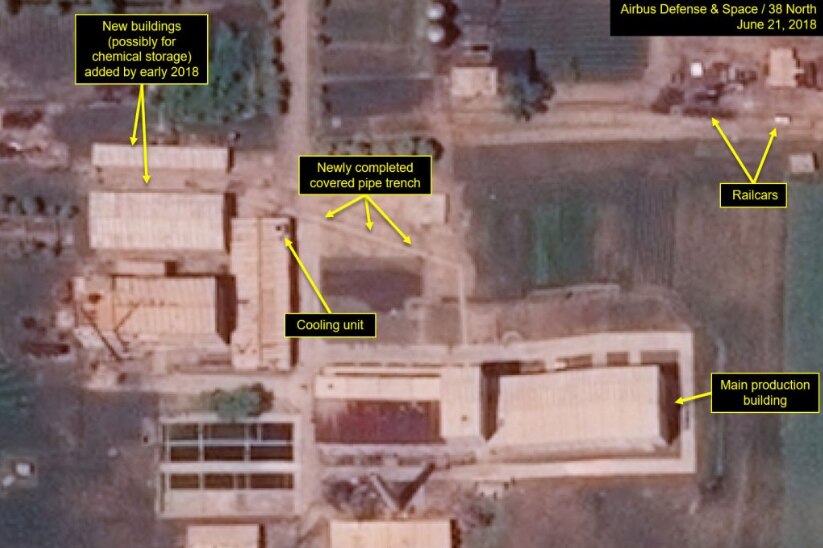 Satellite images showing the pipeline connecting new buildings and the main production building