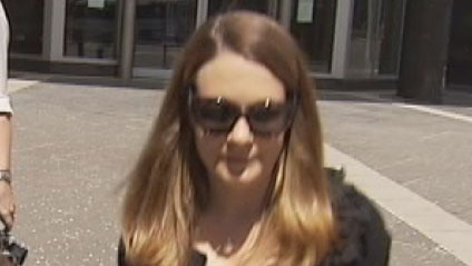 Former University of Queensland researcher Dr Caroline Barwood leaves a Brisbane court
