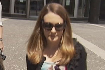 Former University of Queensland researcher Dr Caroline Barwood leaves a Brisbane court