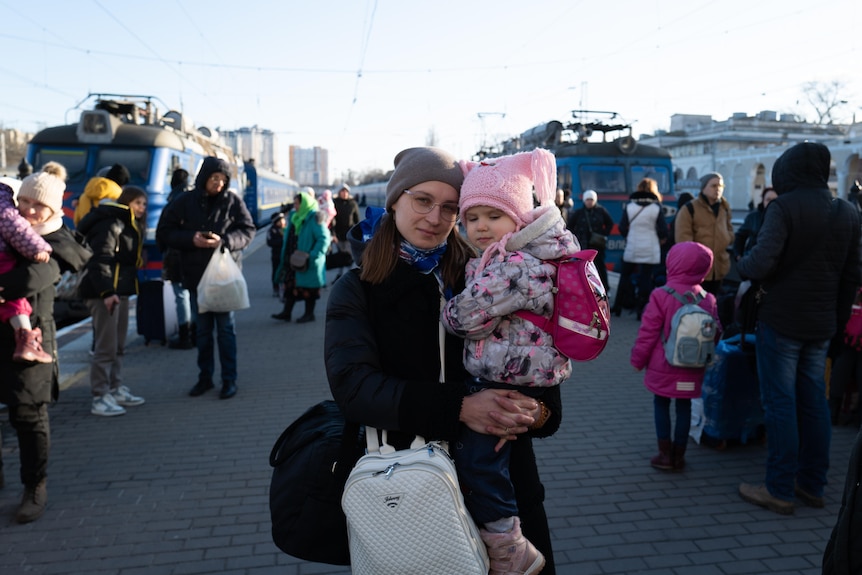 woman with her baby at Odesa train station