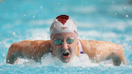 In form ... Jessicah Schipper churns through the water in the 200m butterfly final
