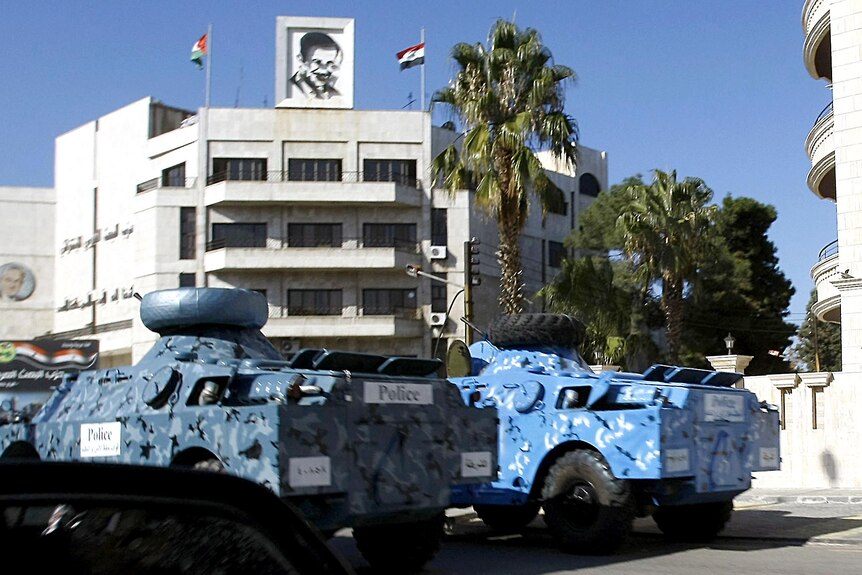 Opposition groups said the army had replaced tanks with blue armoured vehicles.