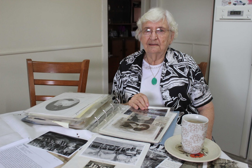 Margaret Wood with the documents she has collected about the history of soldier settlers.