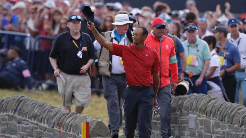 Tiger Woods walks onto the 18th green in the final round of the British Open at Carnoustie.