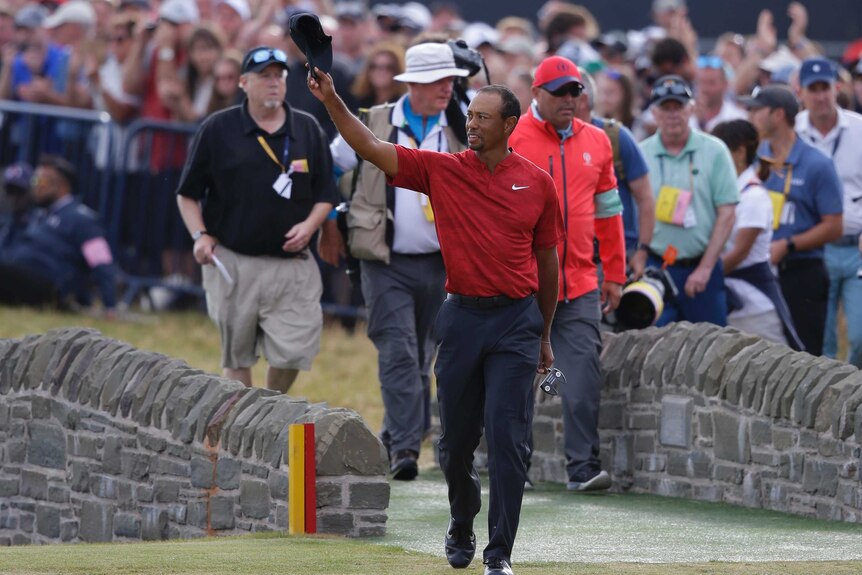 Tiger Woods walks onto the 18th green in the final round of the British Open at Carnoustie.
