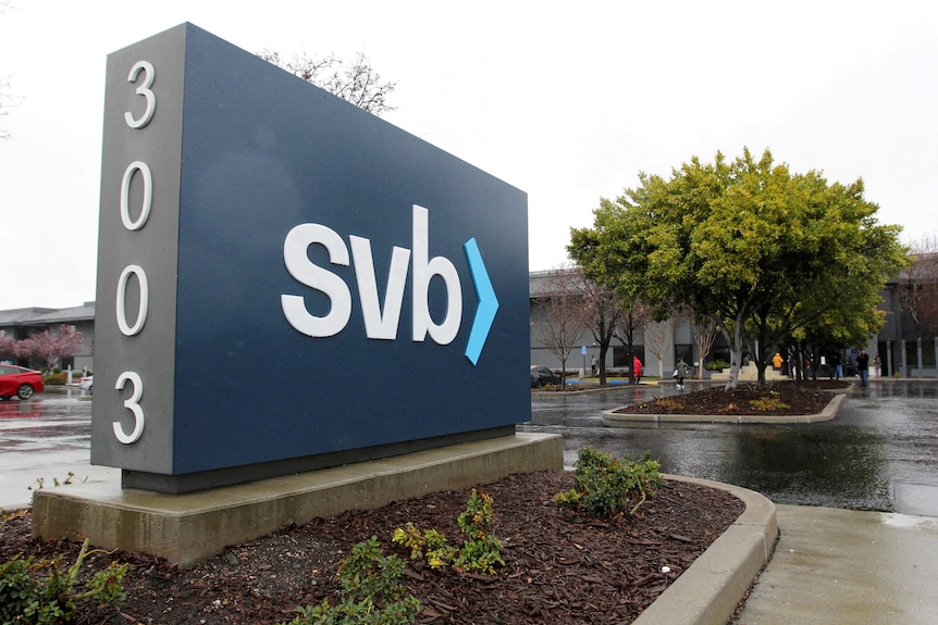 A company sign next to a parking lot displays the numbers 3003 and letters svb.