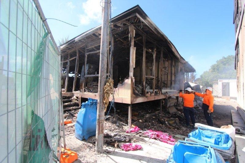 Fire crews put out embers after Nauru detention centre riot