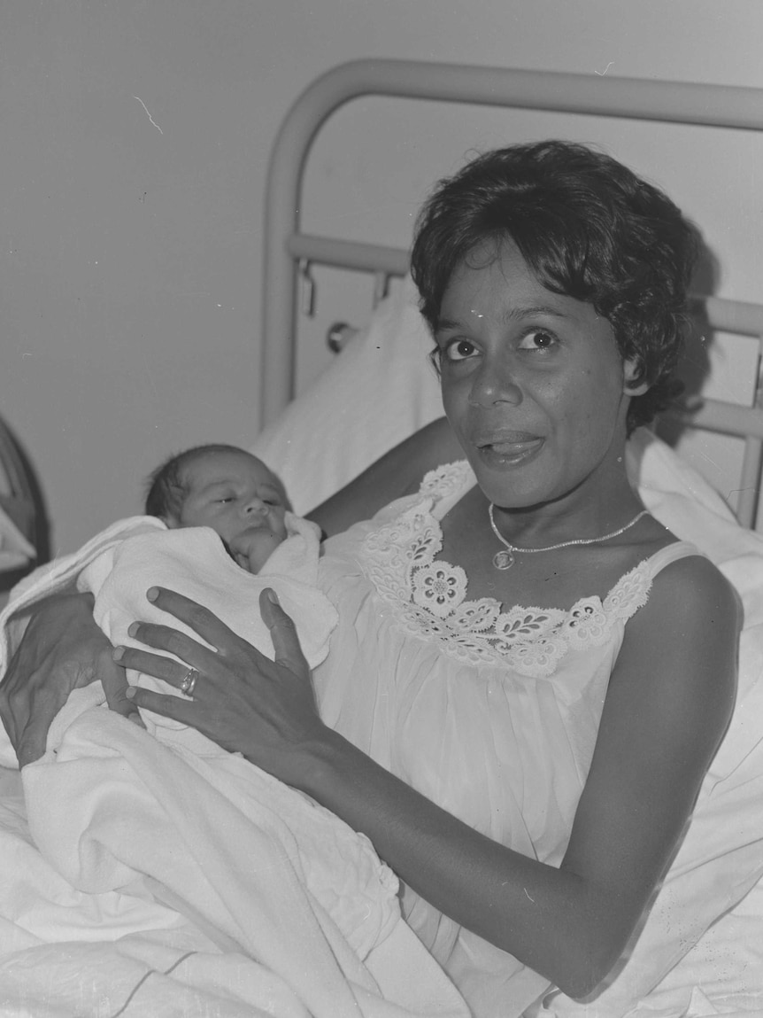 BabyJahari Anthony BinDemin in his mother Sally Bin Demin's arms